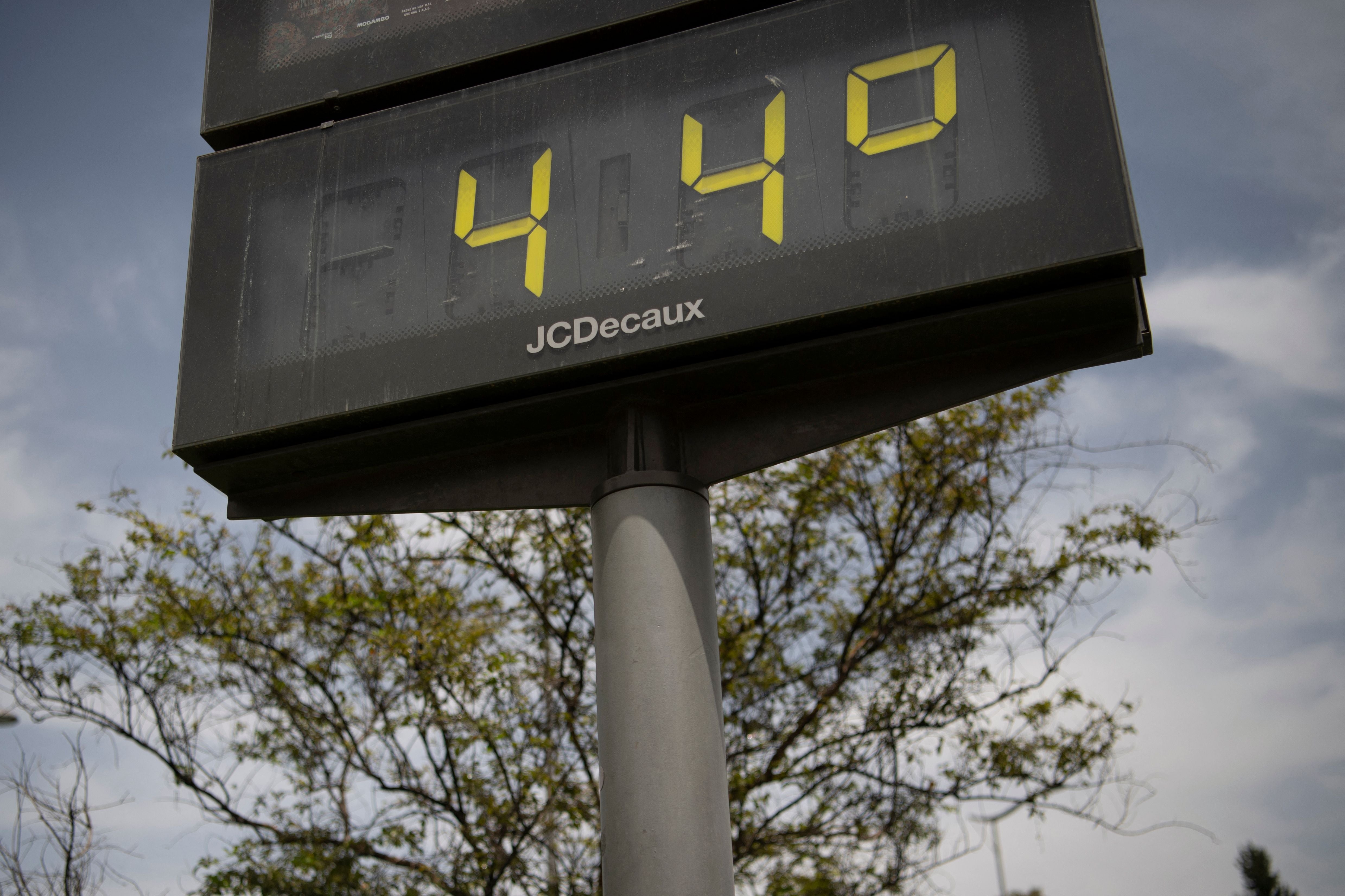 A street thermometer reads 44C during a heatwave in Seville, Spain