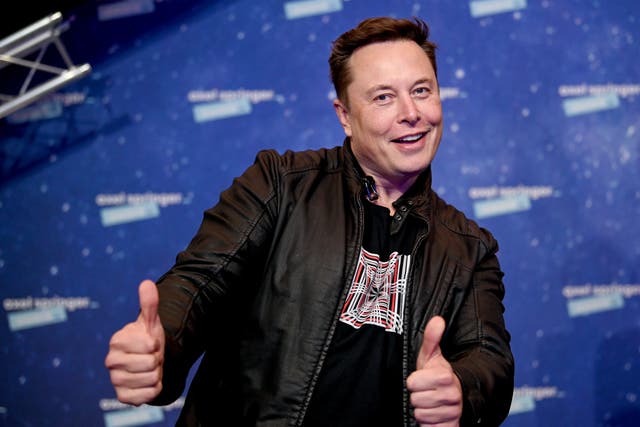 <p>SpaceX owner and Tesla CEO Elon Musk arrives on the red carpet for the Axel Springer Award on 1 December 2020 in Berlin </p>