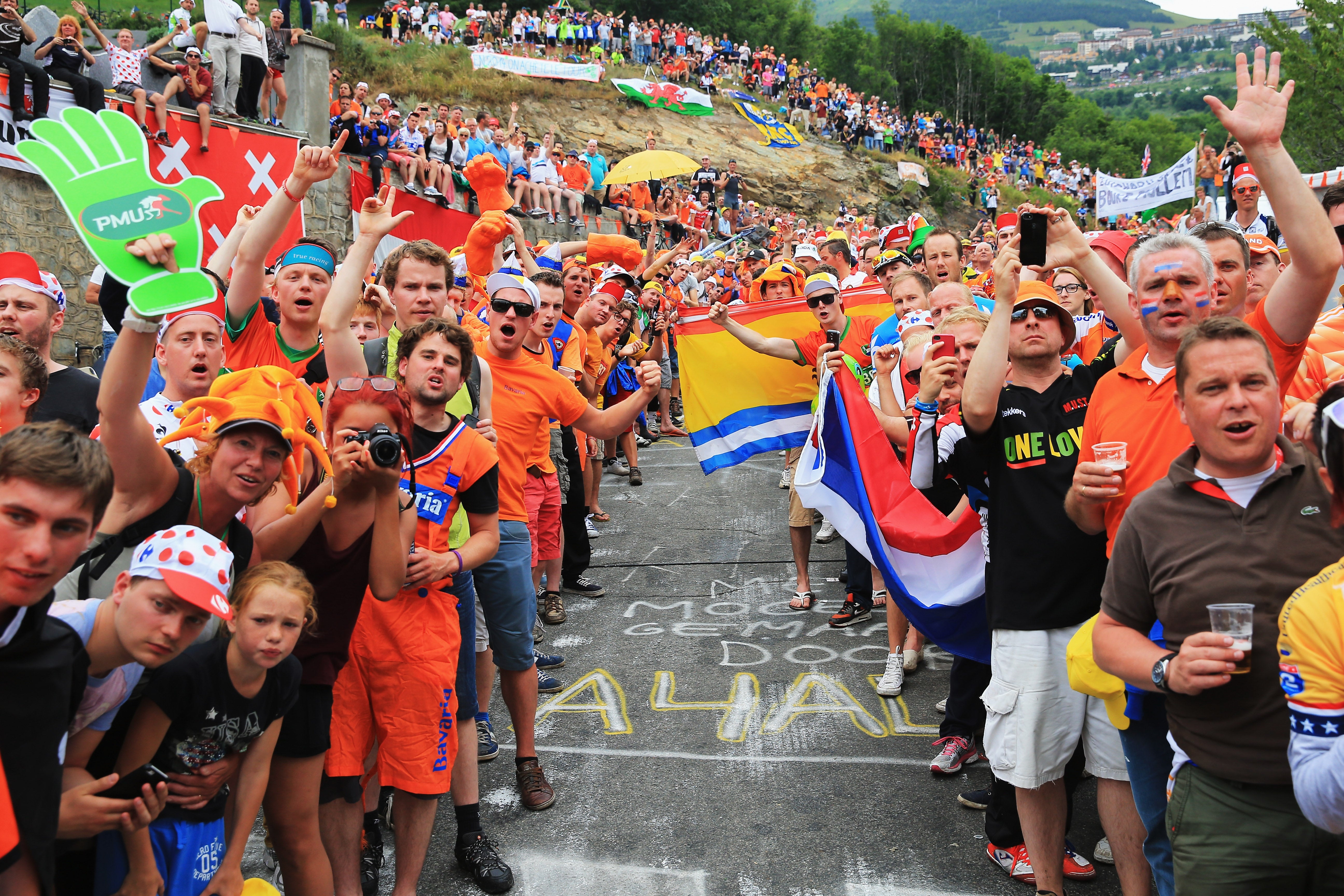 Dutch fans line the road to the top of Alpe d’Huez