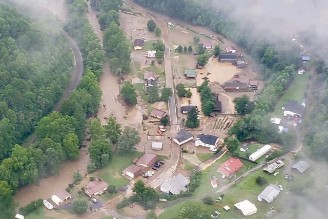 <p>Aerial footage shows flooding in Pilgrim’s Knob, Virginia, a small community in rural Buchanan County </p>