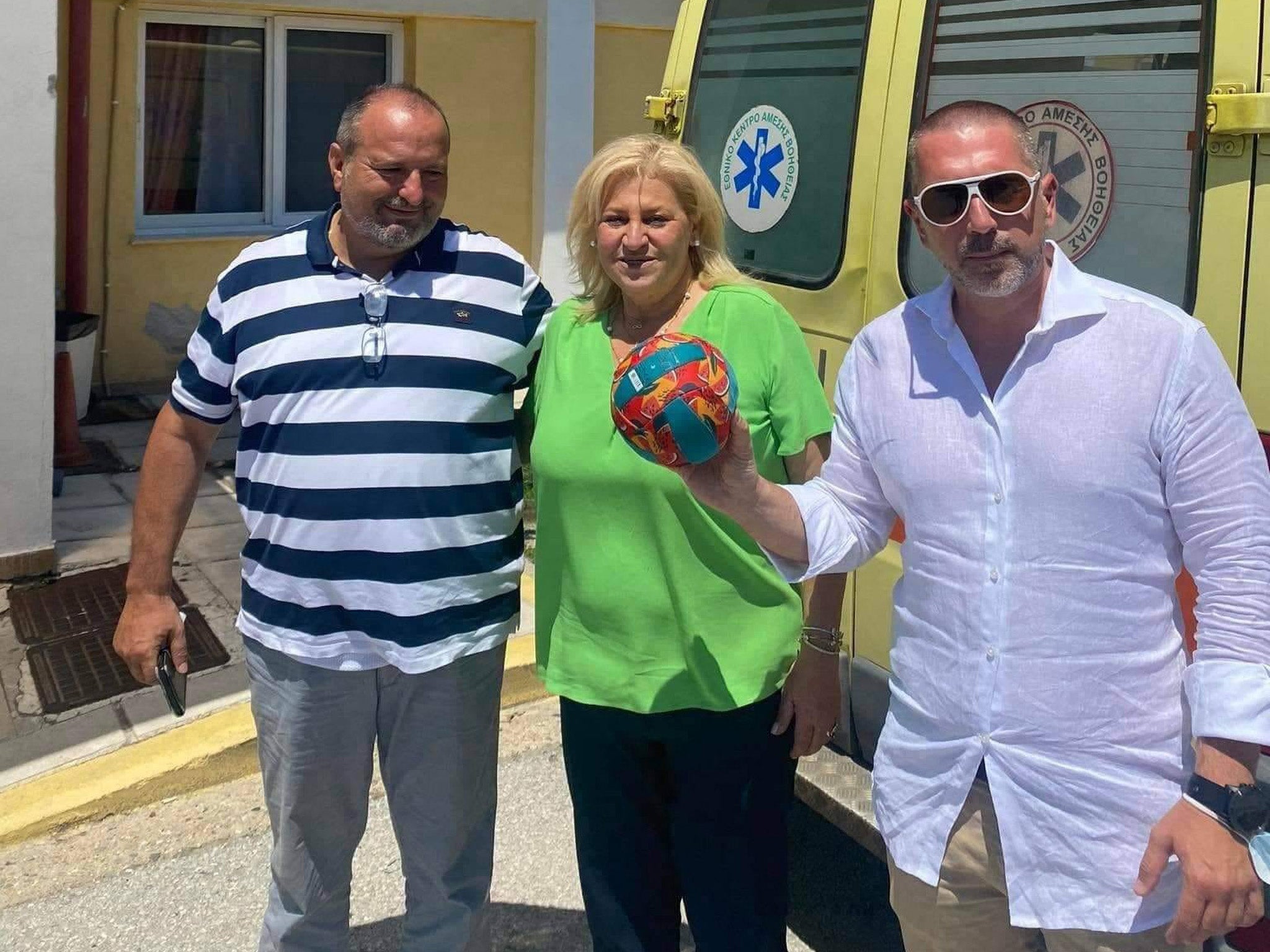Ivan (r), who went missing off the coast of Myti beach, with his father (l) and the mayor of Kassandra, Anastasia Chalkia