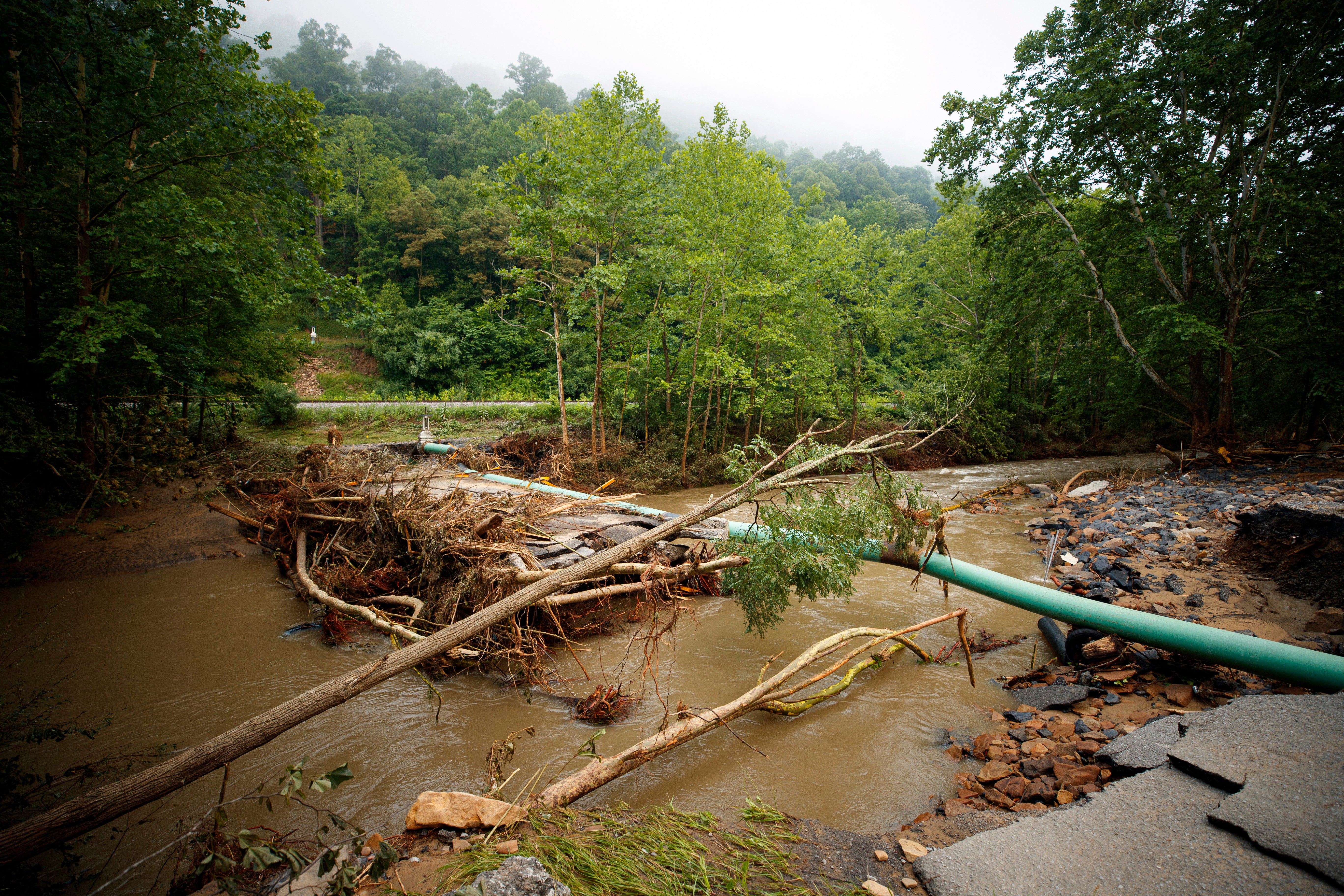 A collapsed bridge in Buchanan County, after intense flooding