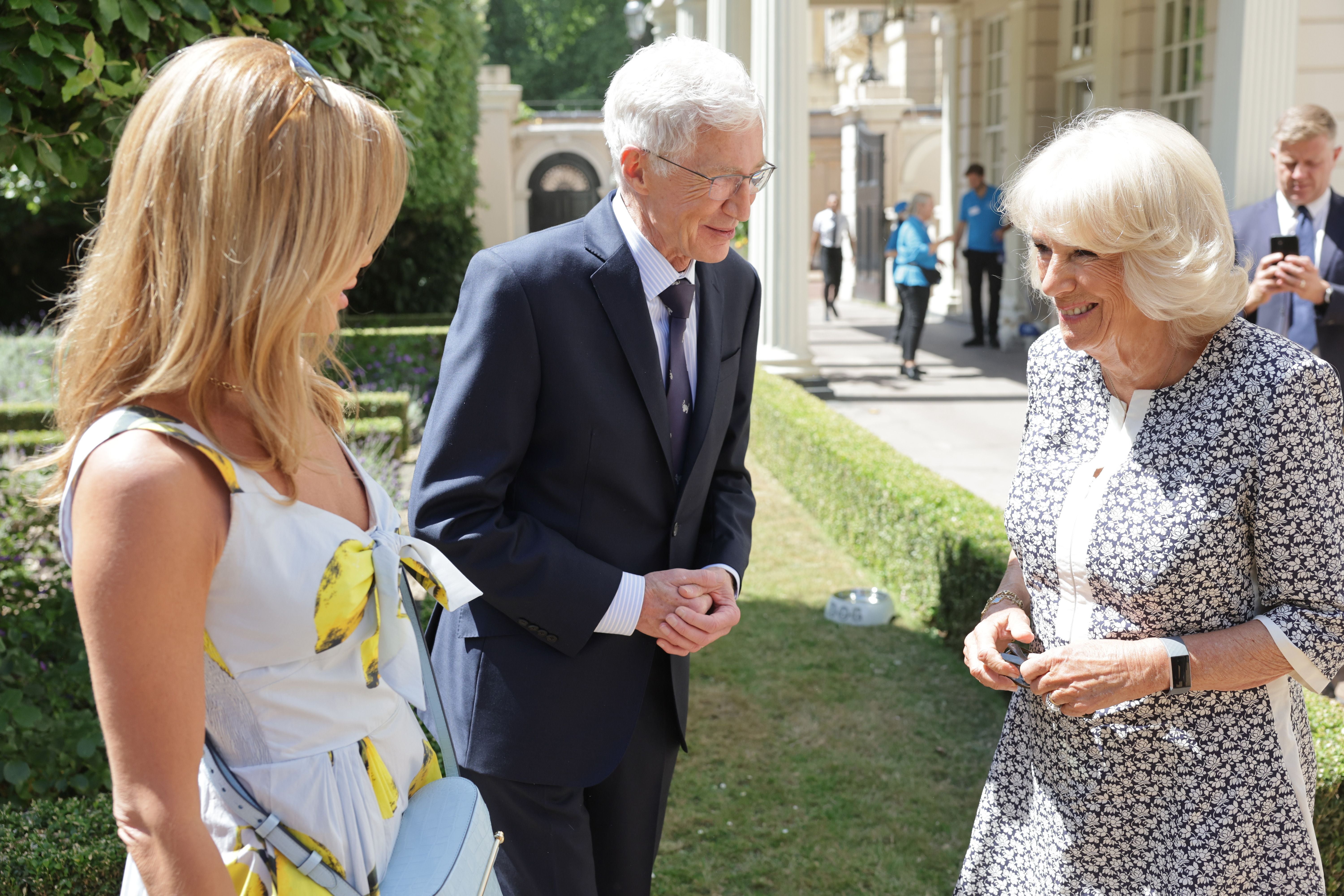The Duchess of Cornwall speaks to Amanda Holden and Paul O’Grady as she hosts a reception at Clarence House