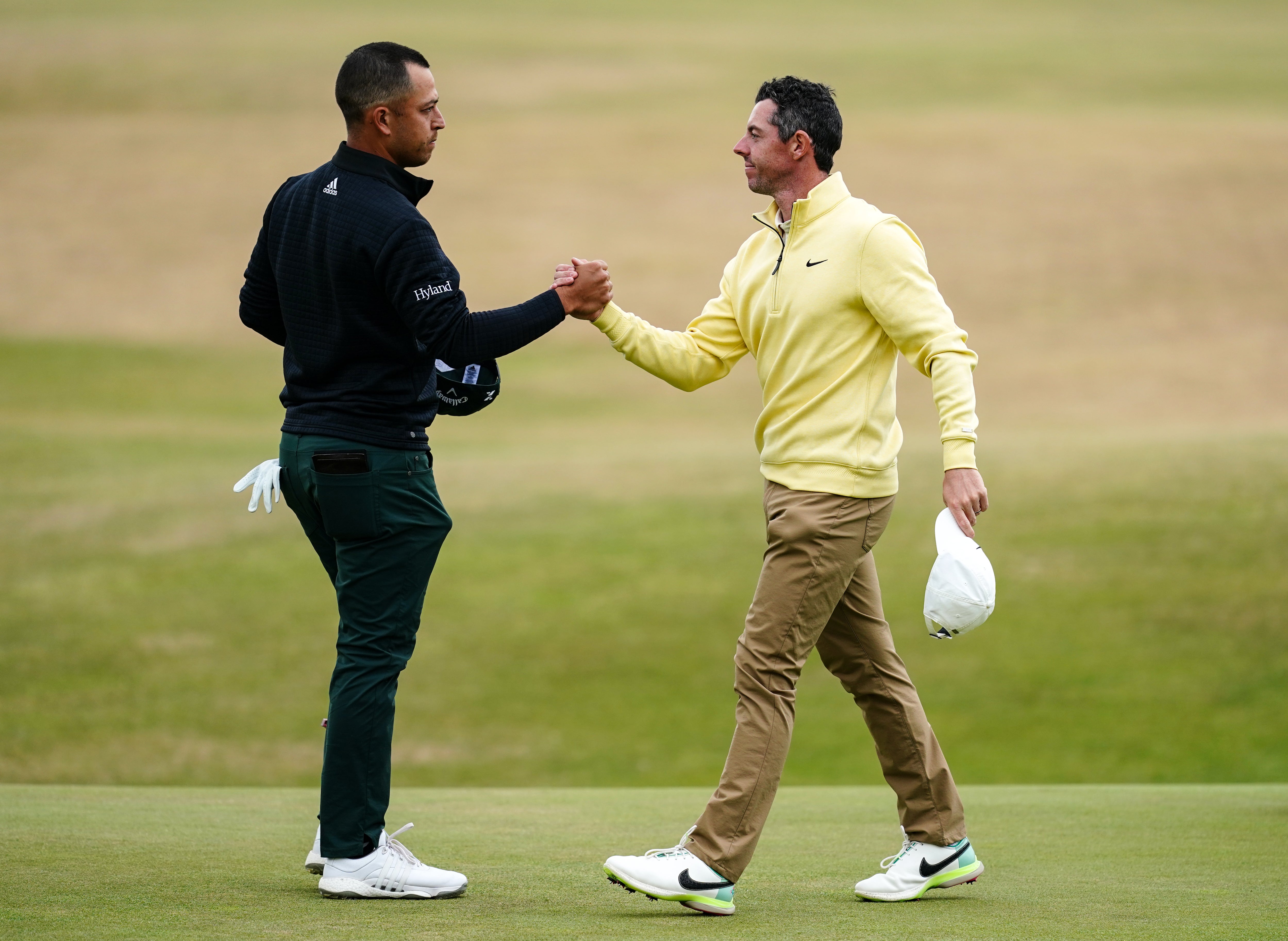 Xander Schauffele (left) and Rory McIlroy after finishing their opening rounds in the 150th Open Championship (David Davies/PA)