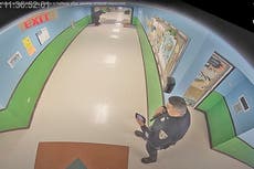Uvalde officer seen checking phone in surveillance footage is husband of teacher killed in massacre