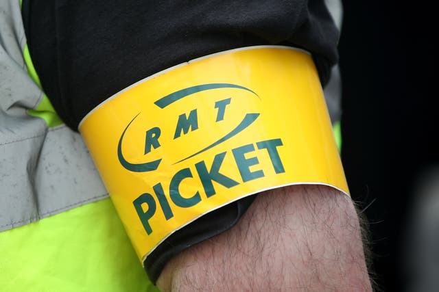 Members of the RMT at Network Rail and 14 train operators will walk out on August 18 and 20 (Simon Marper/PA)