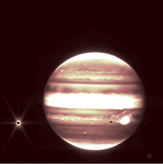 <p>Jupiter as seen in near-infrared light by the James Webb Space Telescope. The Jovian moon Europa is seen at left. </p>