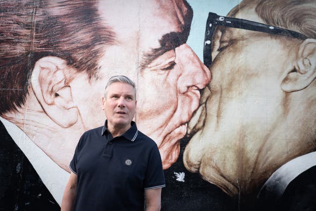 Labour leader Sir Keir Starmer walks past a section of the Berlin Wall known as the East Side Gallery in Berlin (Stefan Rousseau/PA)