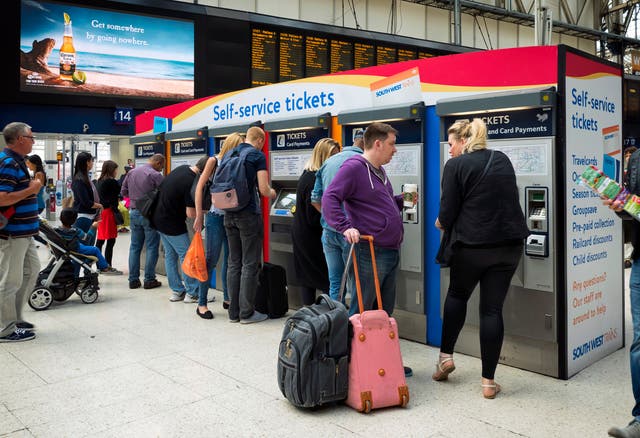 <p>Passengers at London Waterloo Station</p>