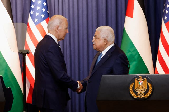 <p>Palestinian President Mahmoud Abbas and U.S. President Joe Biden shake hands after a statement, in Bethlehem</p>