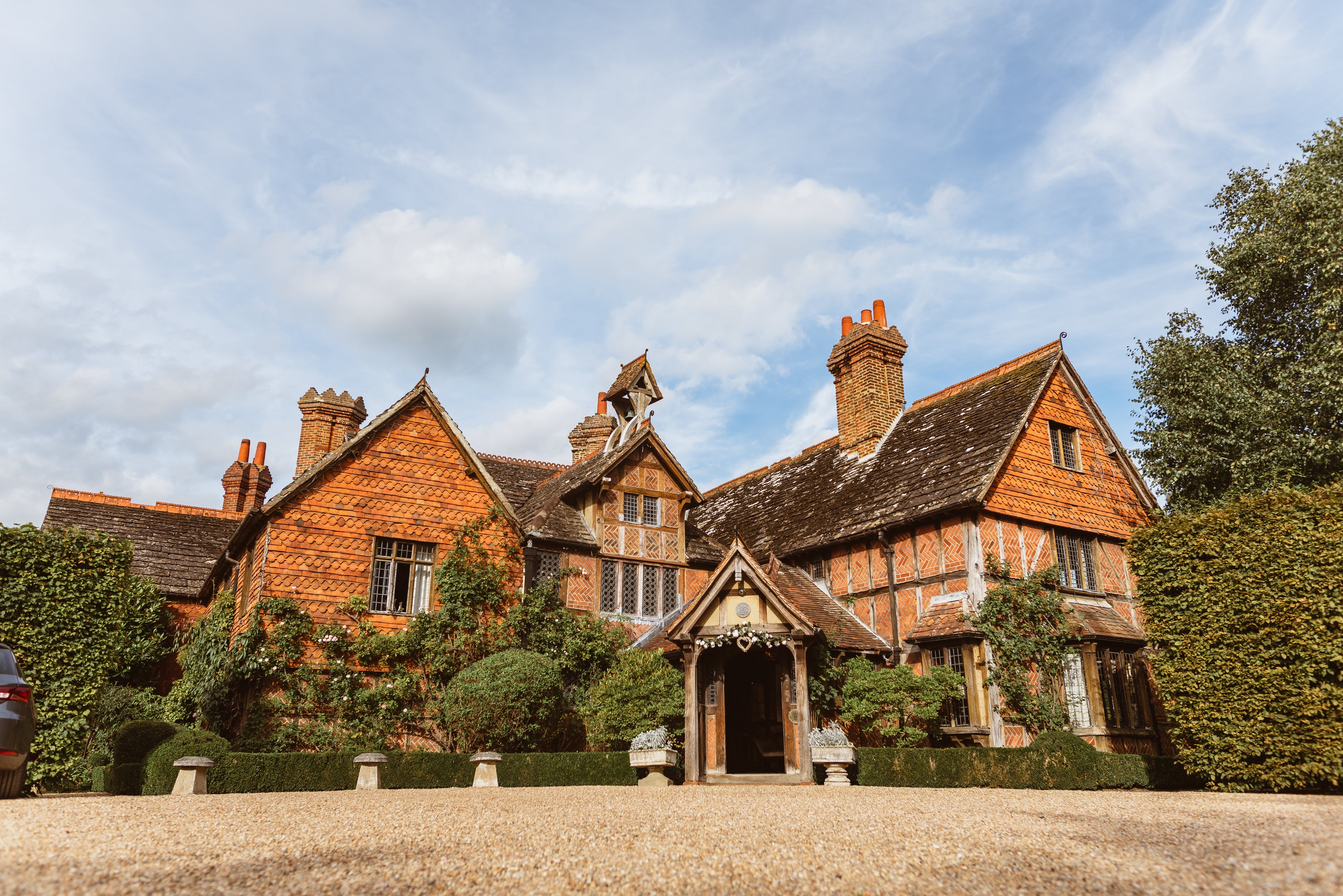 Cosy up by the fireplace in this Tudor-style hotel