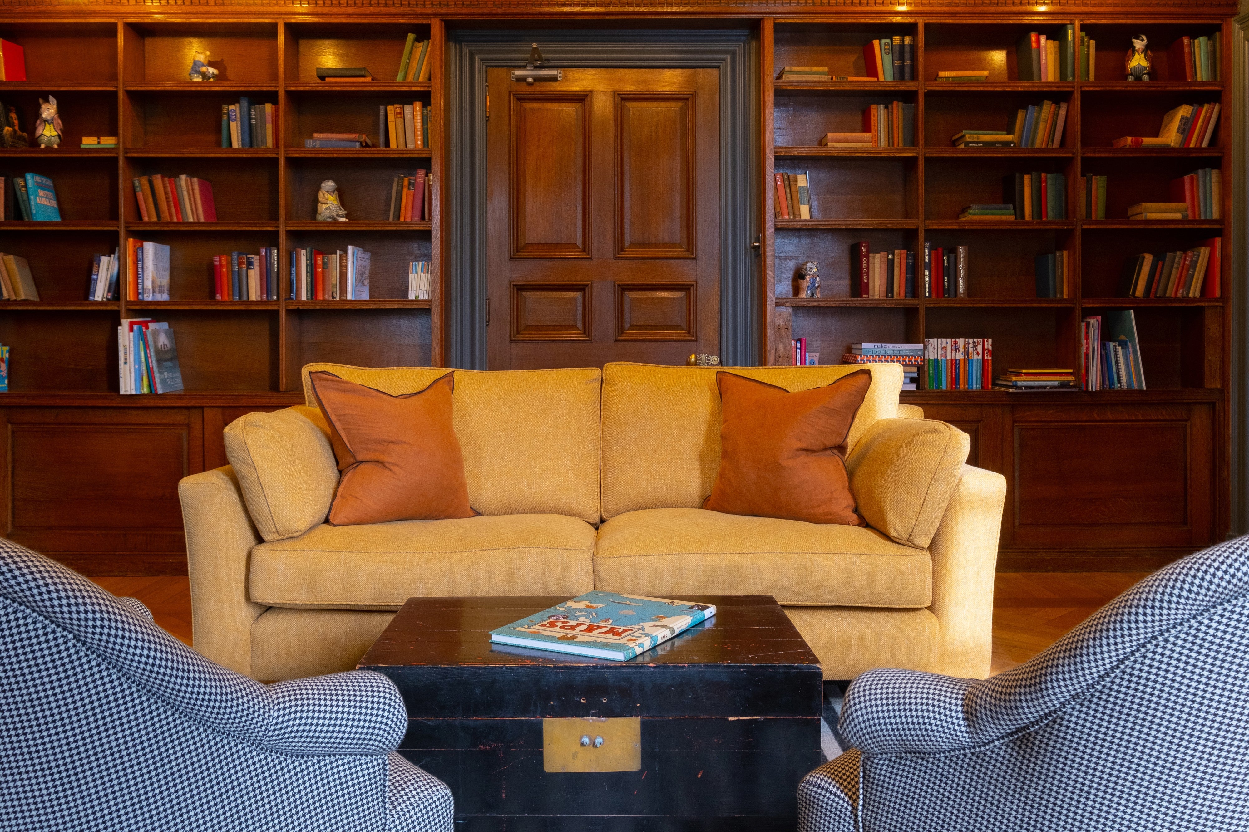 Relax in the reading room at Fowey Hall Hotel
