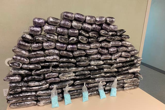 <p>This undated photo provided by the U.S. Drug Enforcement Administration, Los Angeles Field Division, shows some of the seized approximately 1 million fake pills containing fentanyl that were seized when agents served a search warrant, July 5, 2022, at a home in Inglewood</p>