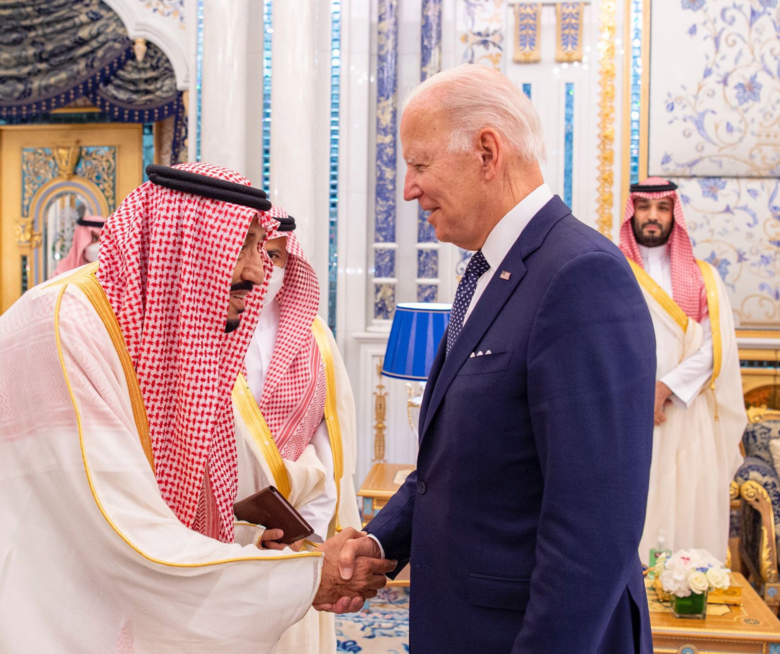 Saudi King Salman bin Abdulaziz Al Saud greets President Joe Biden