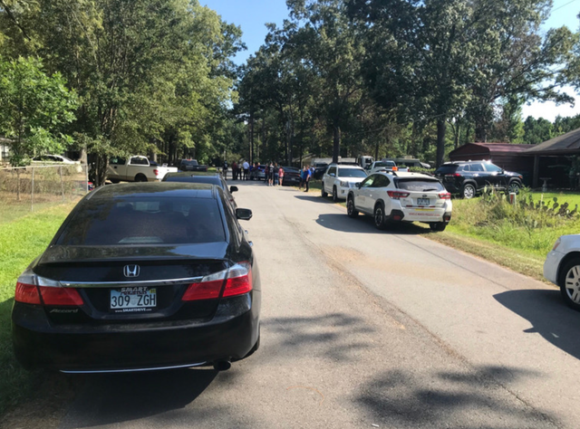 <p>Jefferson County Sheriff’s deputies at the scene where an 8-year-old was shot dead by his 5 year old brother</p>