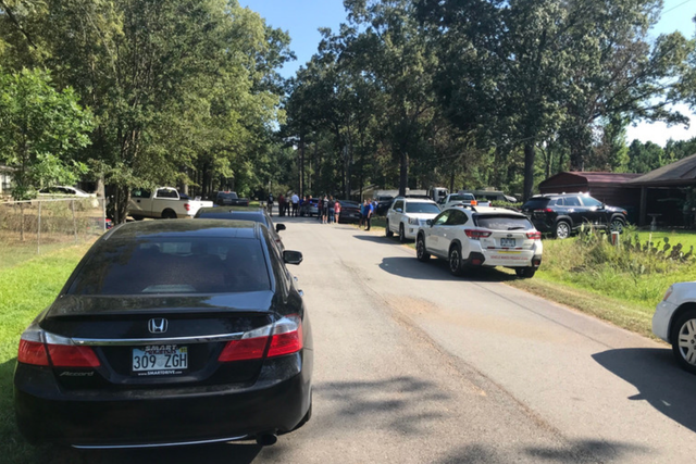 <p>Jefferson County Sheriff’s deputies at the scene where an 8-year-old was shot dead by his 5 year old brother</p>