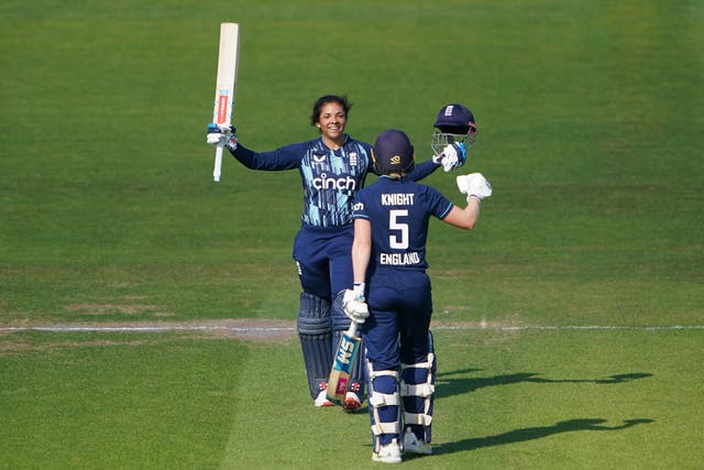 England’s Sophia Dunkley celebrates her century against South Africa (Zac Goodwin/PA)