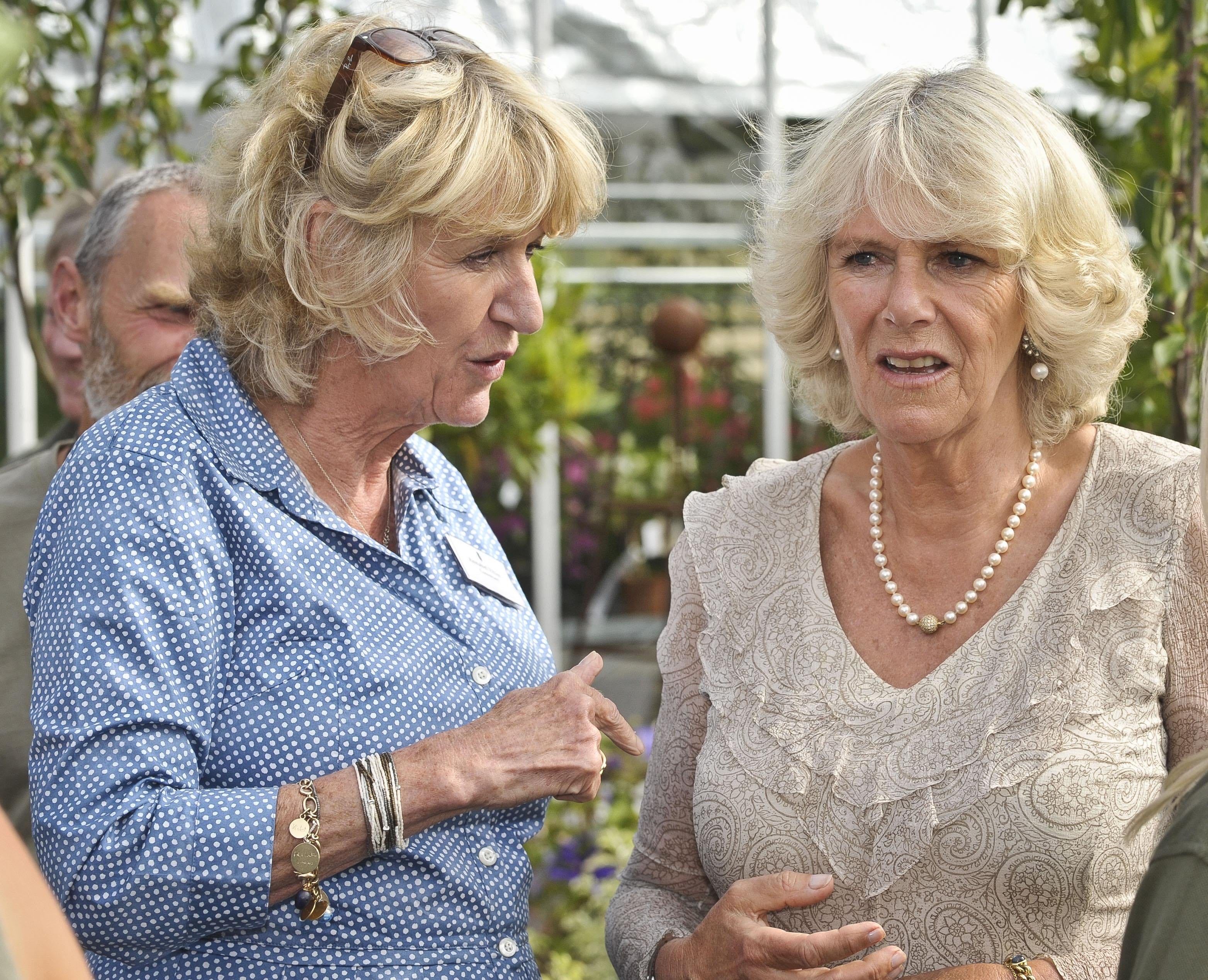 The Duchess of Cornwall chats with her sister Annabel Elliot