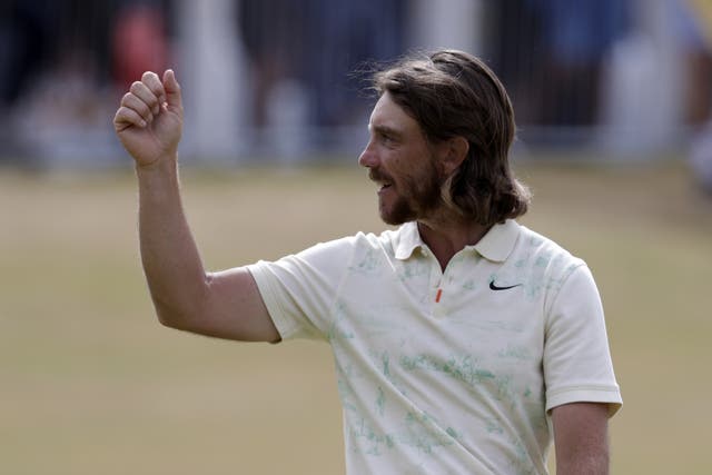England’s Tommy Fleetwood acknowledges the crowd on the 18th hole (Richard Sellers/PA)