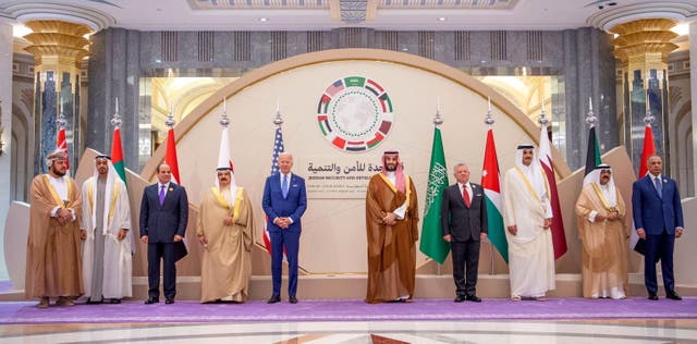 <p>President Joe Biden stands shoulder to shoulder with Saudi Crown Prince Mohammed bin Salman for a photo on Saturday </p>