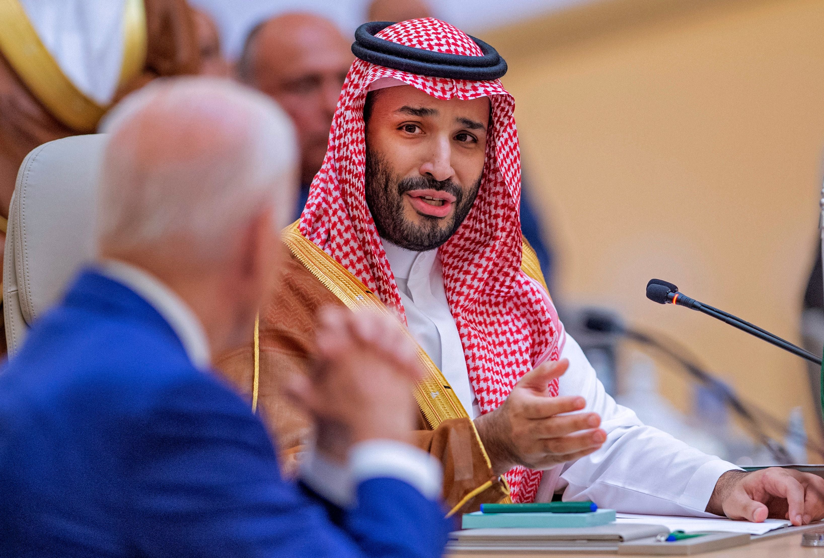 Saudi Crown Prince Mohammed bin Salman speaking to US President Joe Biden during the Jeddah Security and Development Summit on Saturday