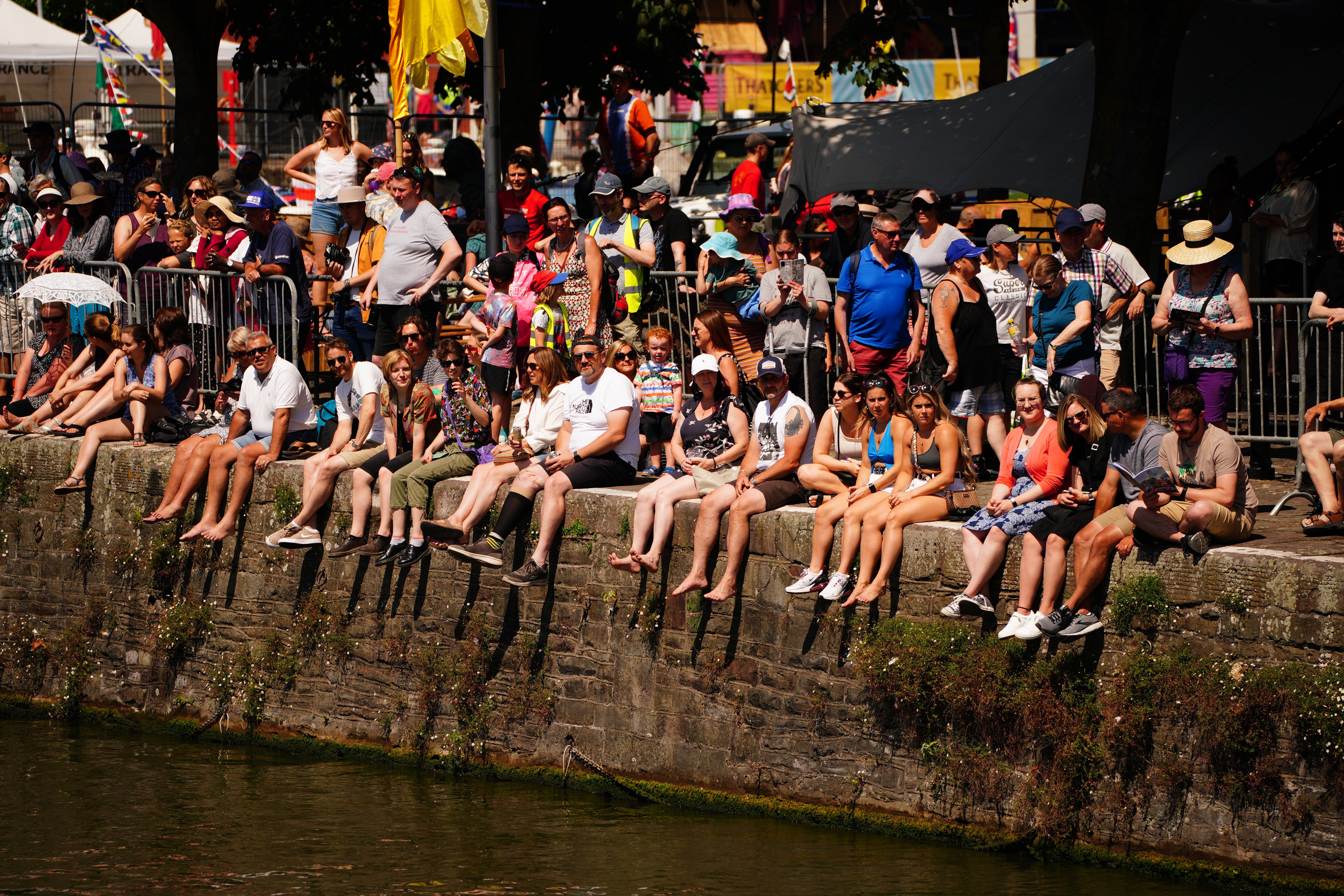 Crowds at the harbour wall enjoying the good weather during the Bristol Harbour Festival (Ben Birchall/PA)
