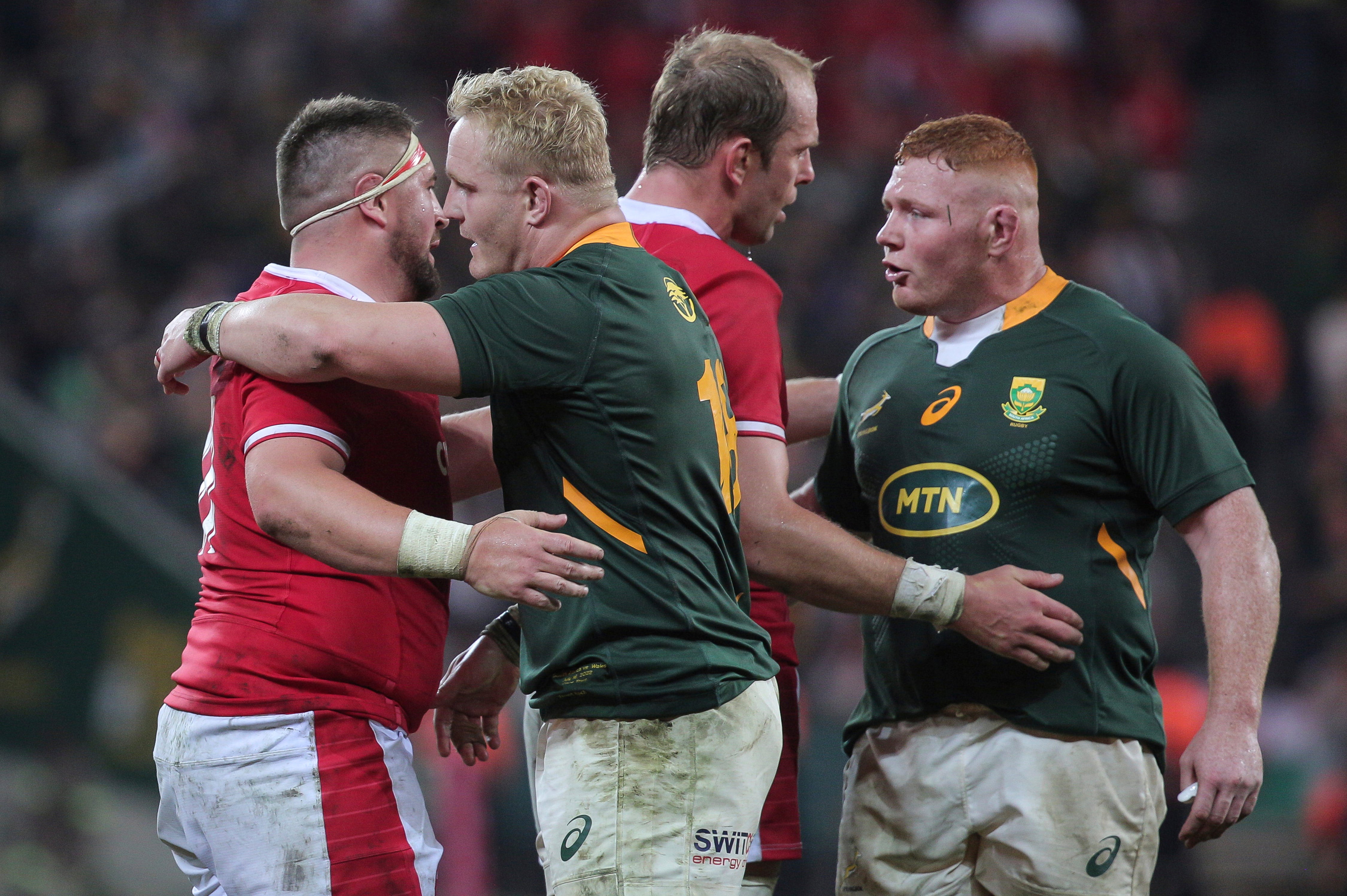 Wales and South Africa players embrace at the end of the hard-fought series (Halden Krog/AP).