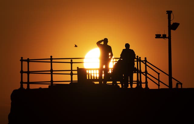 People look at the sun from North Berwick Harbour on the East Lothian coast (Jane Barlow/PA)