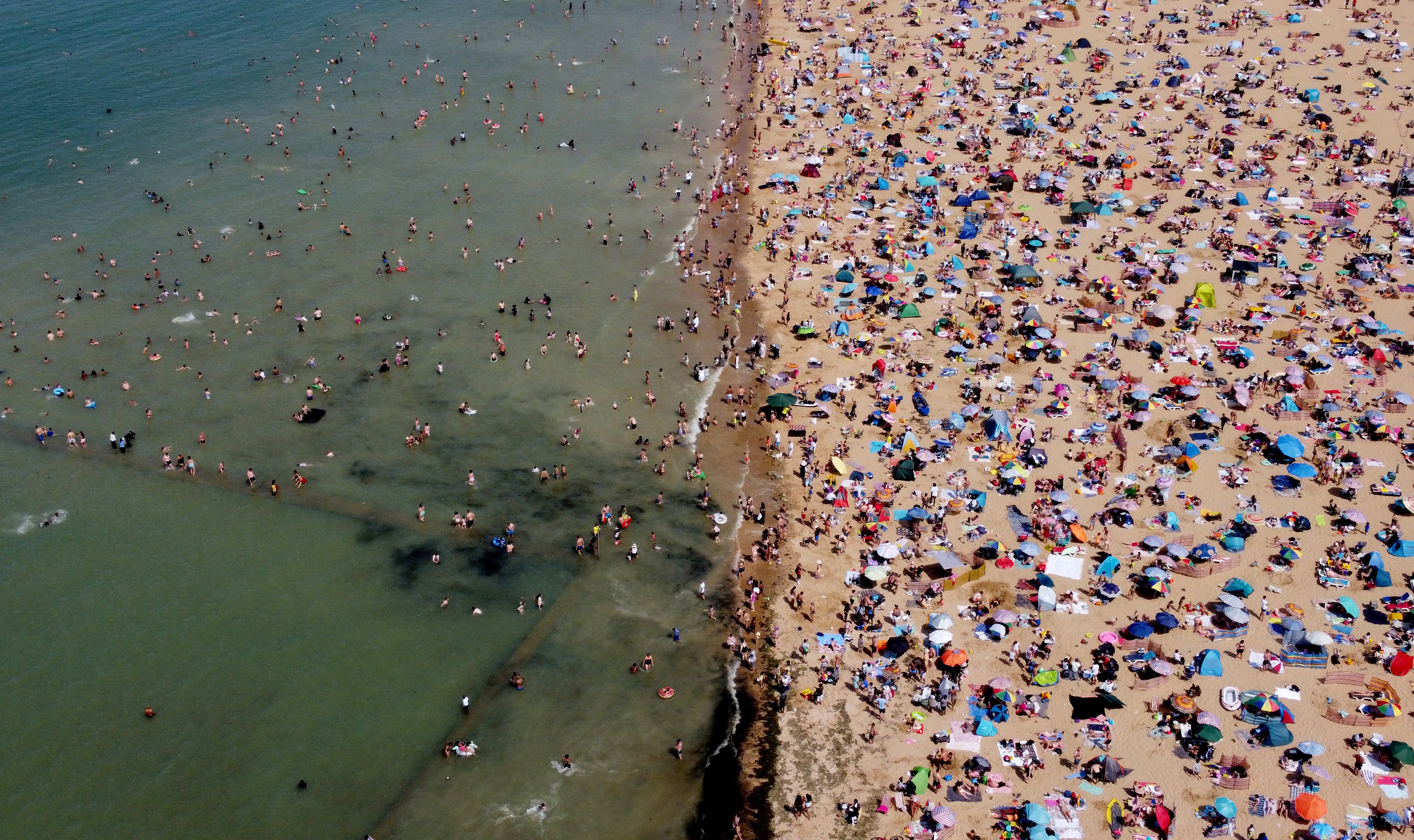A view of people on the beach in Margate, Kent (Gareth Fuller/PA)