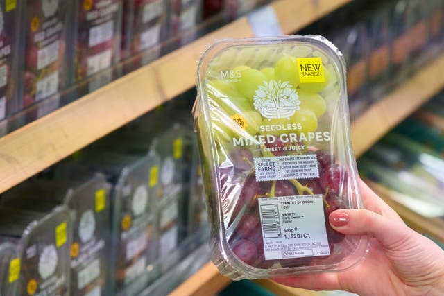 <p>A tub of grapes from Marks and Spencer with the best before date removed. Marks and Spencer will remove best before dates from more than 300 fruit and vegetable products in a bid to reduce food waste</p>