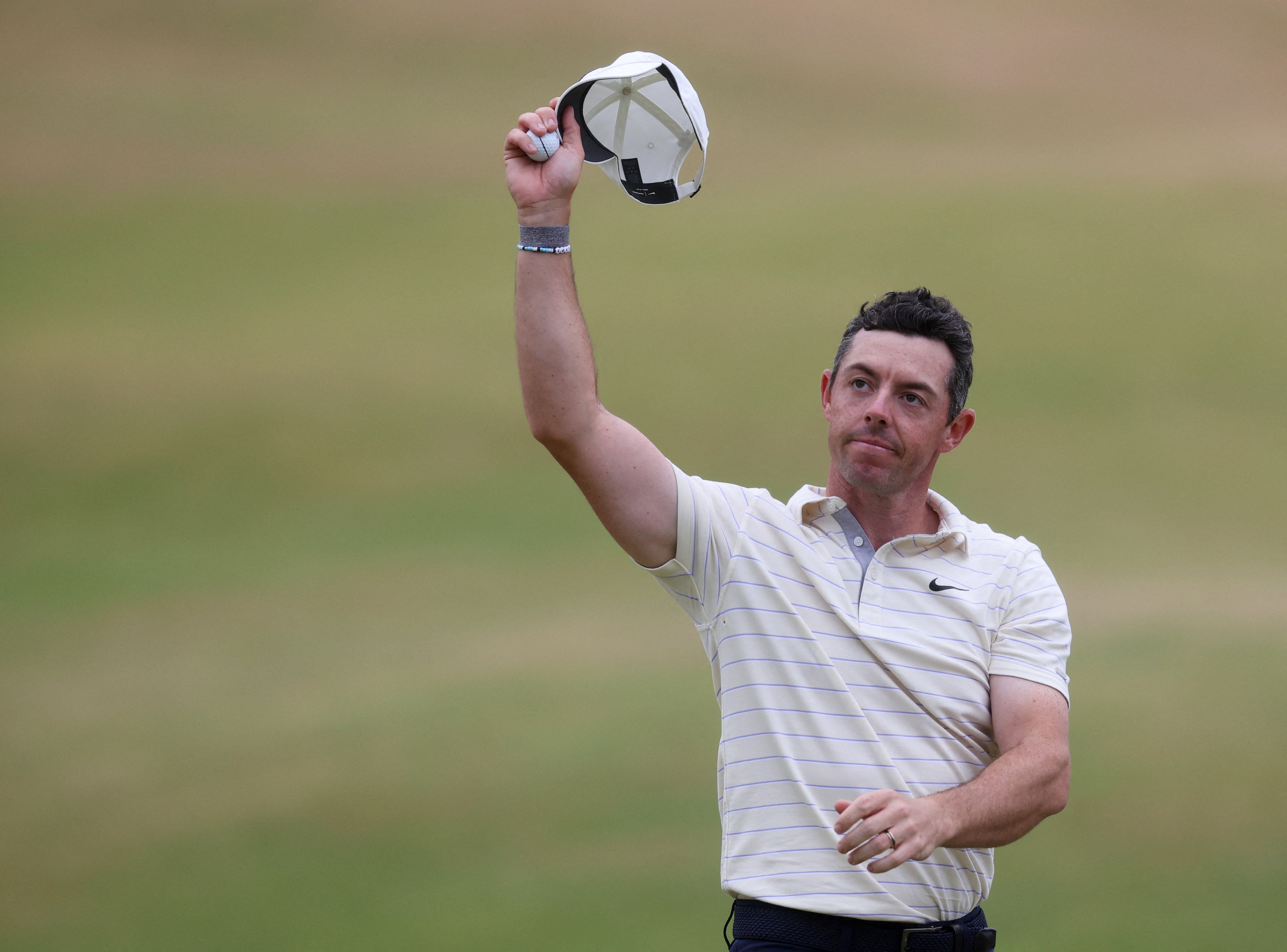 Rory McIlroy salutes the crowd at St Andrews