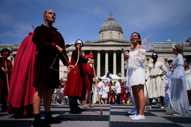 A living chess set, with 32 professional actors taking on the role of the chess pieces, take part in ChessFest, the UK’s largest one-day chess event, at Trafalgar Square, central London. Picture date: Sunday July 17, 2022.