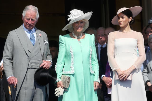<p>Prince Charles, the Duchess of Cornwall, and Meghan Markle in May 2018</p>