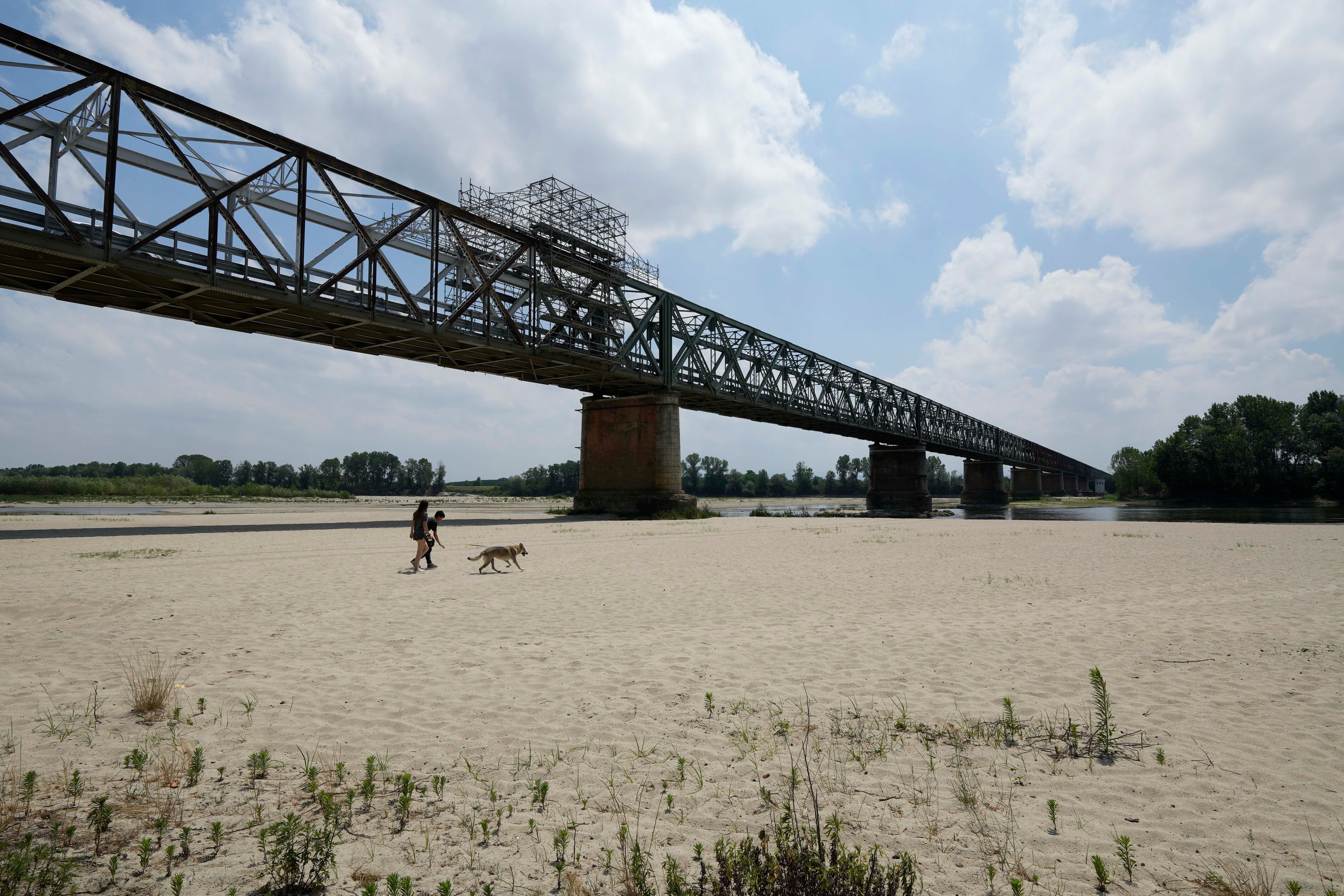A view of the Po riverbed under Ponte della Becca shows the effects of the drought