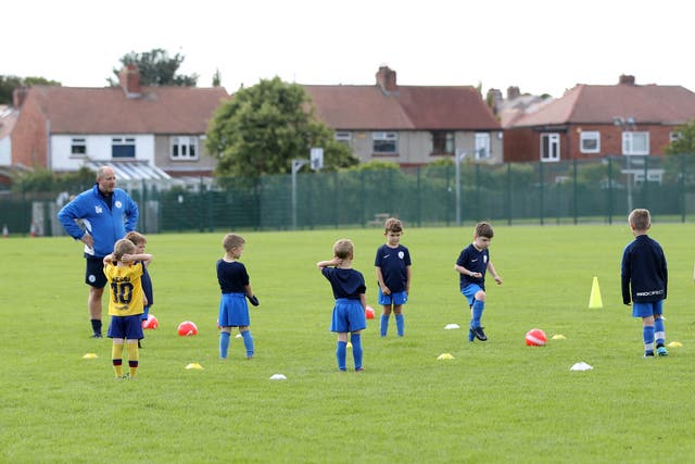 The FA is to trial the removal of heading in selected competitions for under-12s and younger age groups in the season ahead (Owen Humphreys/PA)