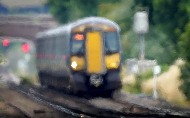 Millions more people are working from home to avoid severe disruption to transport networks caused by soaring temperatures (Gareth Fuller/PA)