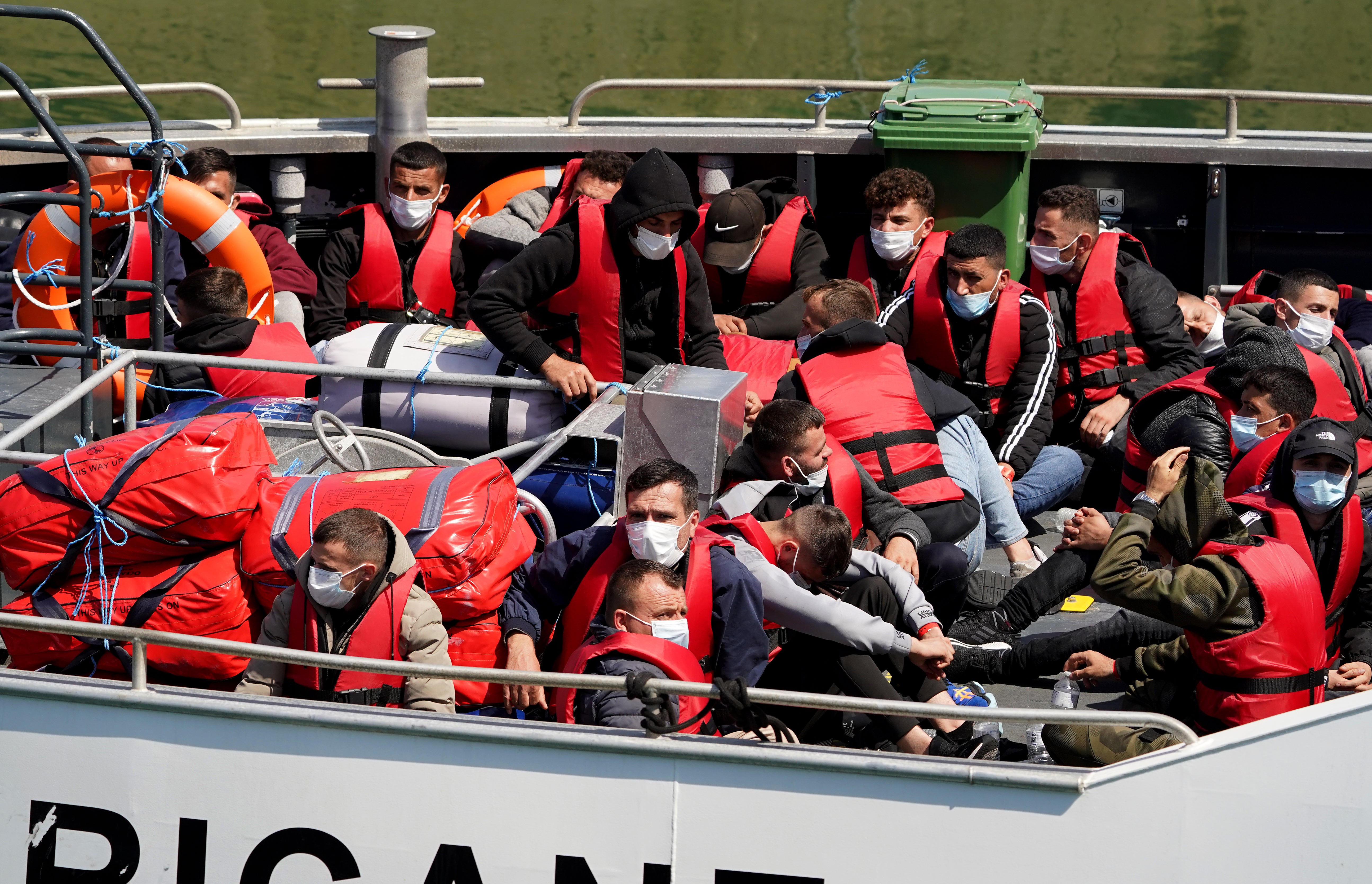 A group of people thought to be migrants are brought in to Dover, Kent, onboard a Border Force vessel following a small boat incident in the Channel (Gareth Fuller/PA)