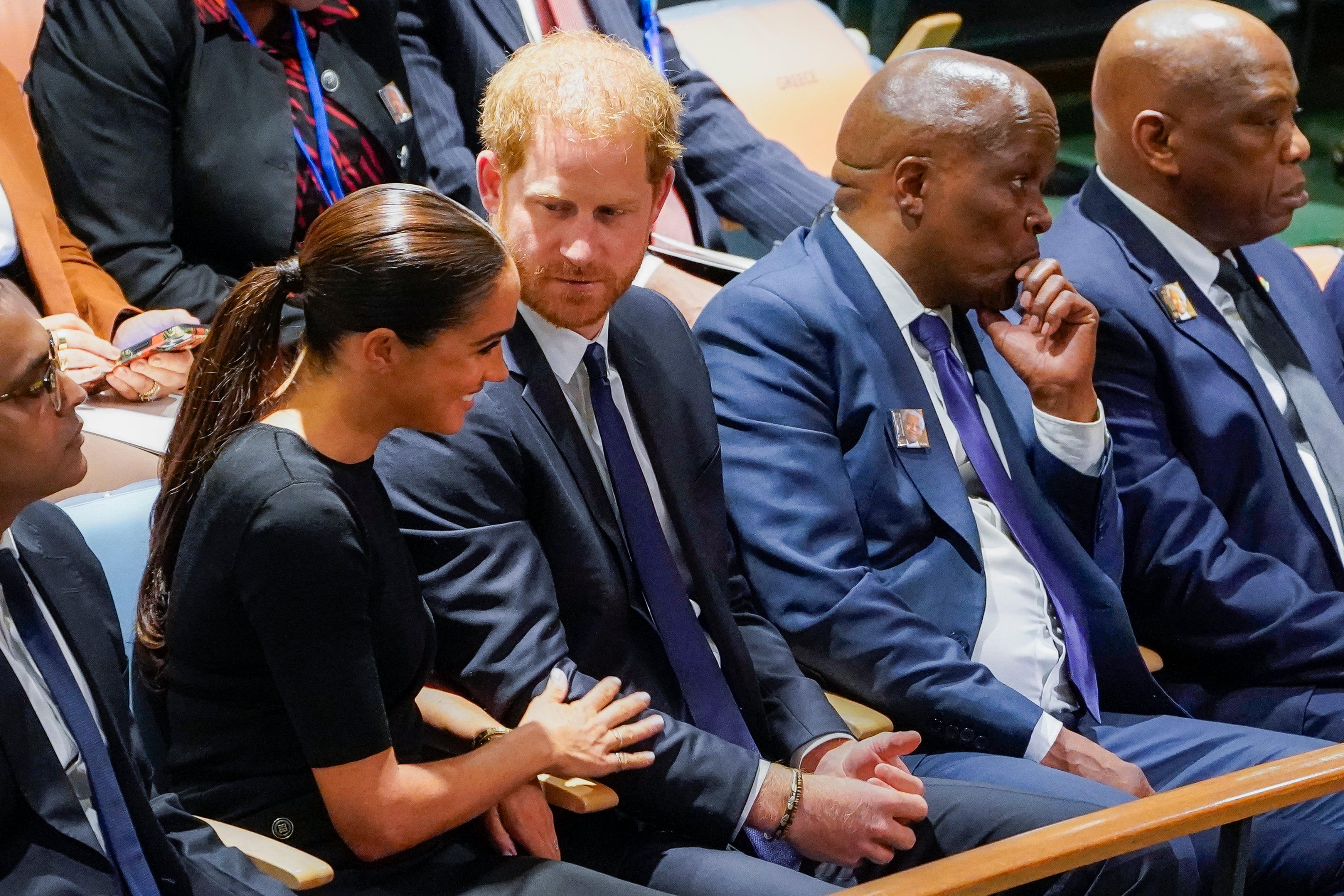 The duke was joined by his actress wife Meghan (John Minchillo/AP)