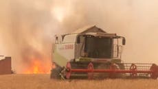 Planes and a combine harvester used to contain wildfire in Spain’s Zamora province