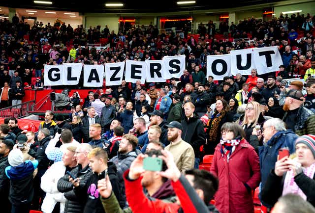 <p>Manchester United fans protest against the Glazer family in April (Martin Rickett/PA)</p>