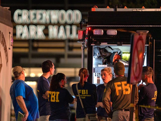 <p>FBI agents gather at the scene of a deadly shooting, Sunday, July 17, 2022, at the Greenwood Park Mall, in Greenwood, Ind</p>