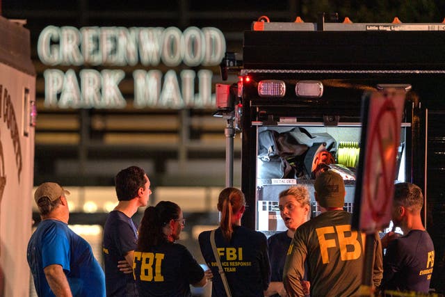<p>FBI agents gather at the scene of a deadly shooting, Sunday, July 17, 2022, at the Greenwood Park Mall, in Greenwood, Ind</p>