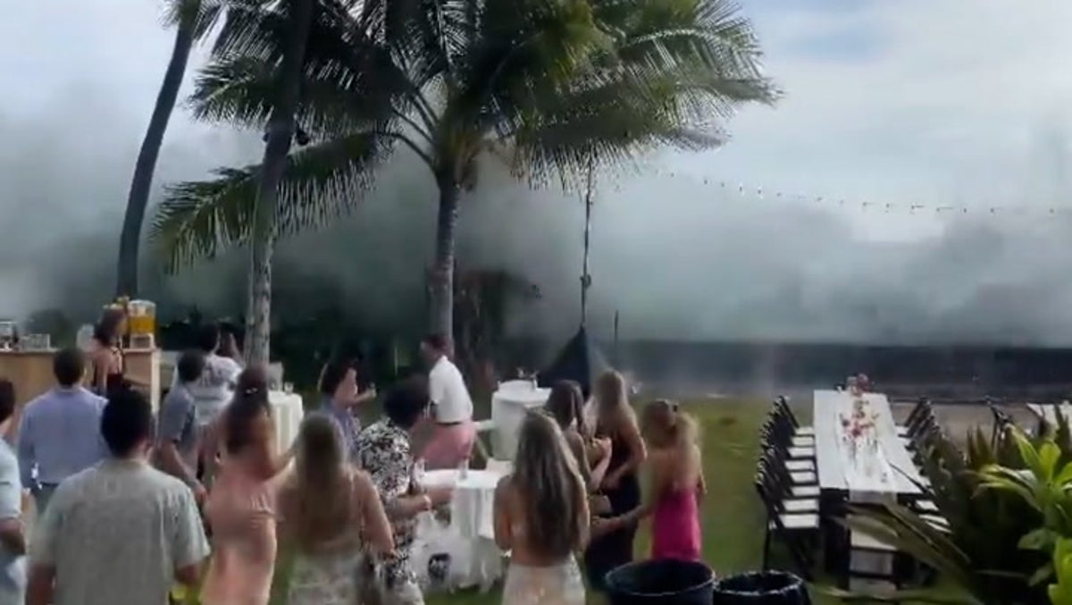 Huge waves crash into wedding reception in Hawaii after tropical storm