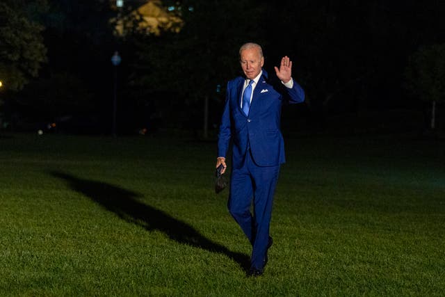 <p>President Joe Biden walks off Marine One on the South Lawn of the White House on July 16, 2022 </p>