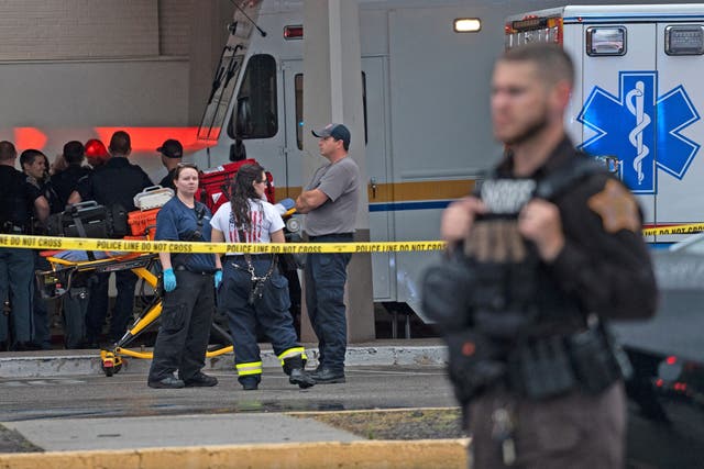 <p>Emergency personnel gather after a shooting at a mall in Greenwood, Indiana, on Sunday </p>