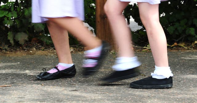 Six weeks’ worth of holiday childcare could cost working parents nearly £500 more per child typically than the same period during school term time, according to Coram Family and Childcare (Ian West/PA)