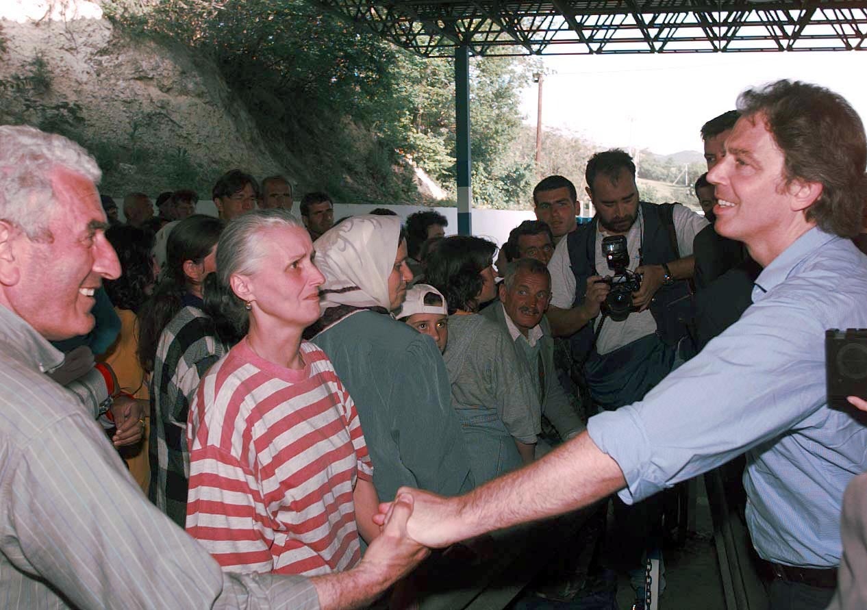 Prime Minister Tony Blair meets Kosovan refugees at the border crossing point between Kosovo and Macedonia, near Skopje (John Stillwell/PA)