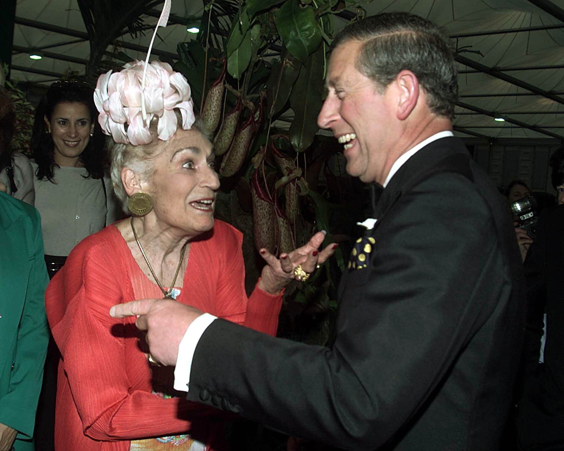 The Prince of Wales is greeted by Lady Walton, widow of English composer Sir William Walton, at her garden exhibit at the Chelsea Flower show in 2000 (PA)
