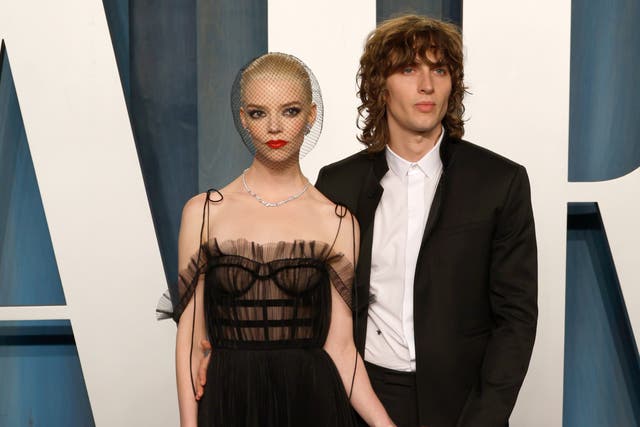 <p>Anya Taylor-Joy and partner Malcom McRae at the Vanity Fair Oscar Party in March 2022</p>