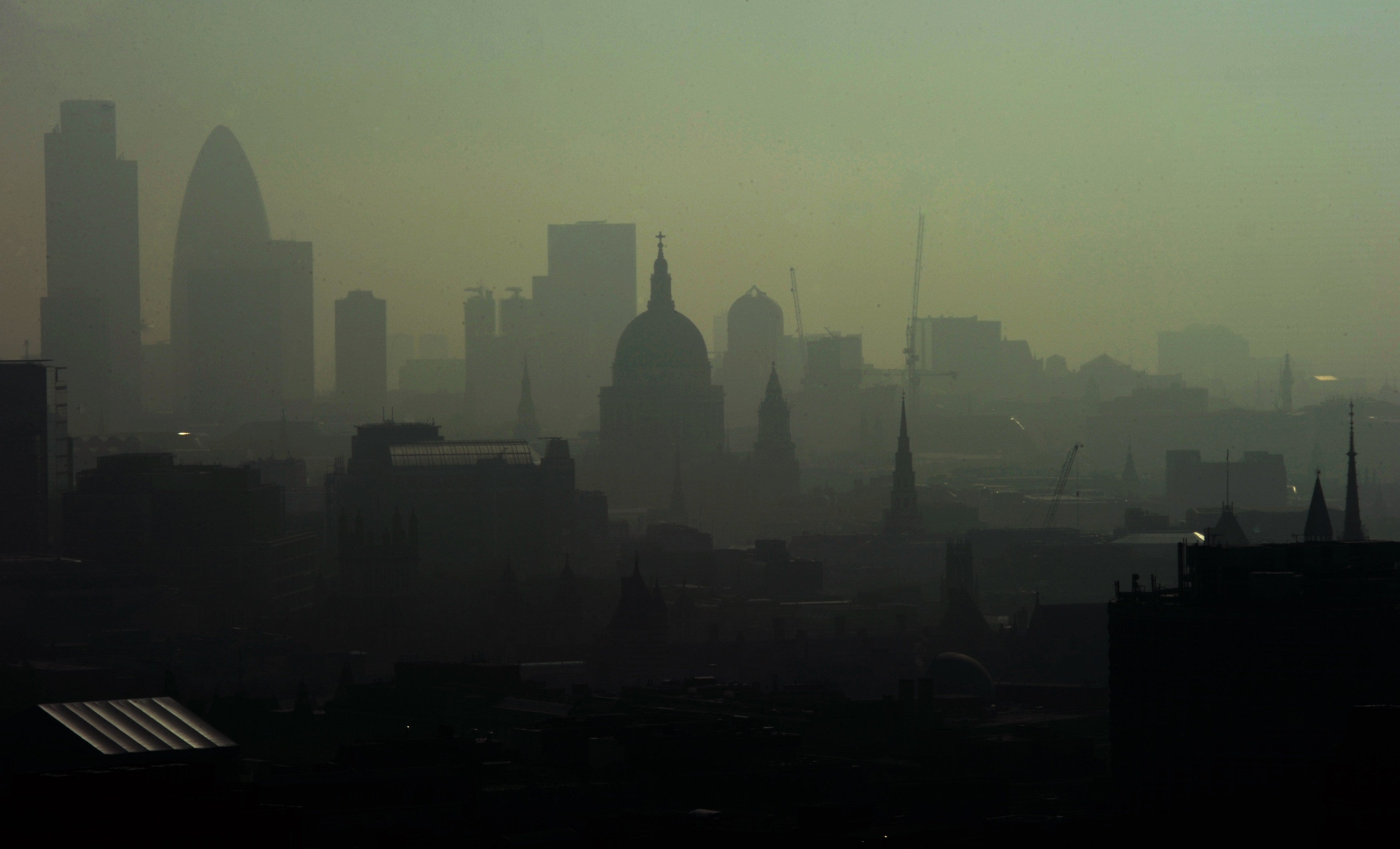 St. Paul’s Cathedral is seen among the skyline through the smog in 2011.